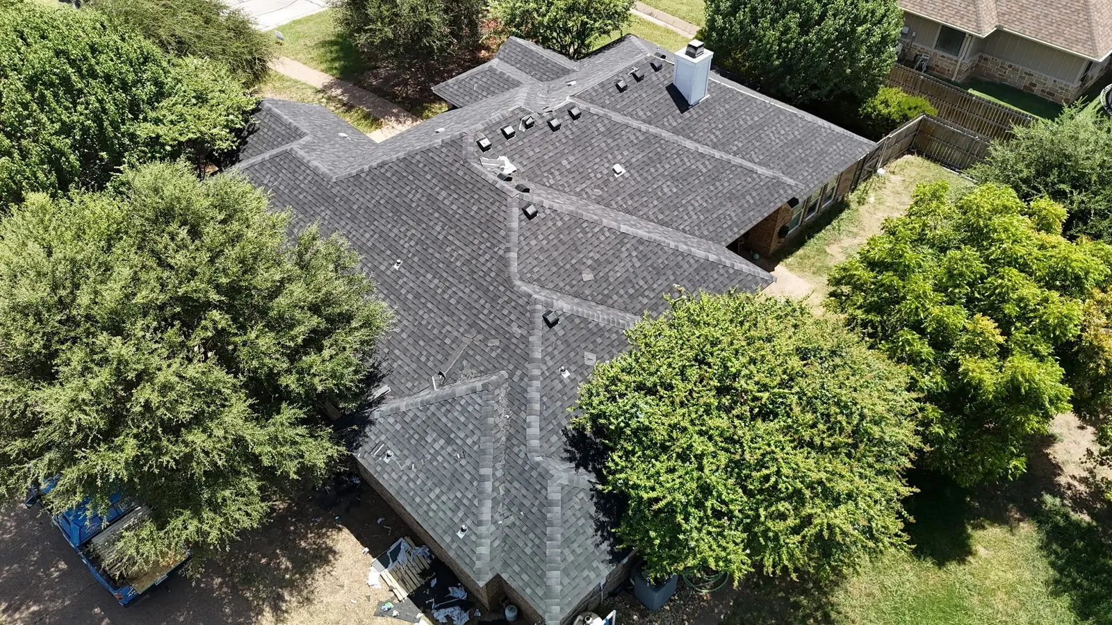 A finished roof replacement on a Waco home, seen from above