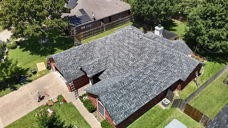 Completed roof replacement with new ridge line, from above